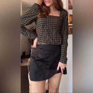 Green and black long sleeve top